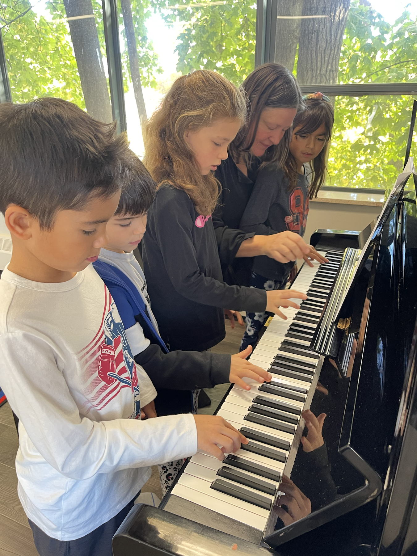 Students gathered at Musica Music School in Toronto during a school showcase event
