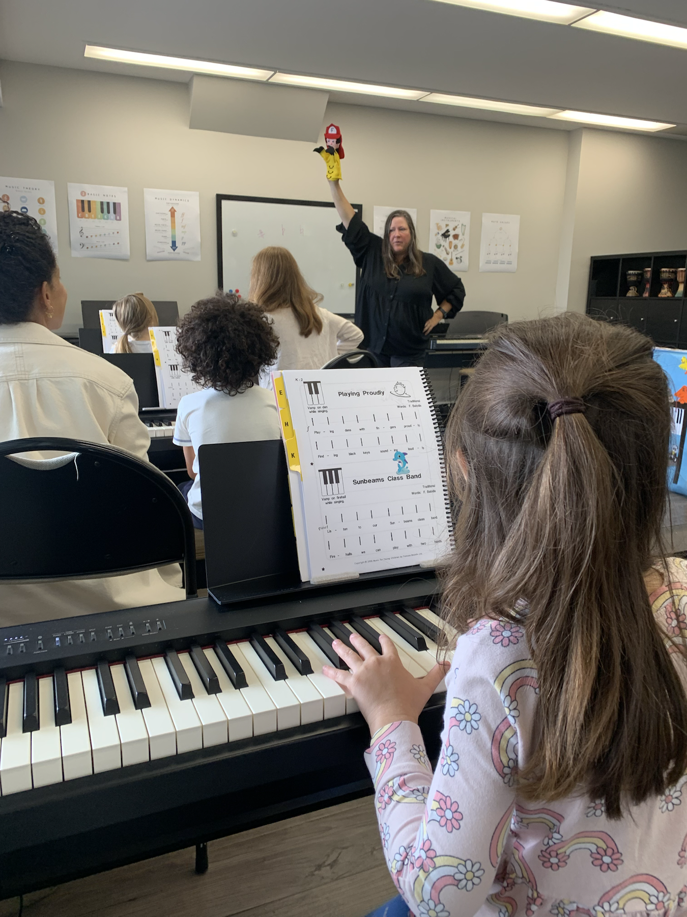 Children participating in a Music for Young Children group class at Musica Music School in Toronto